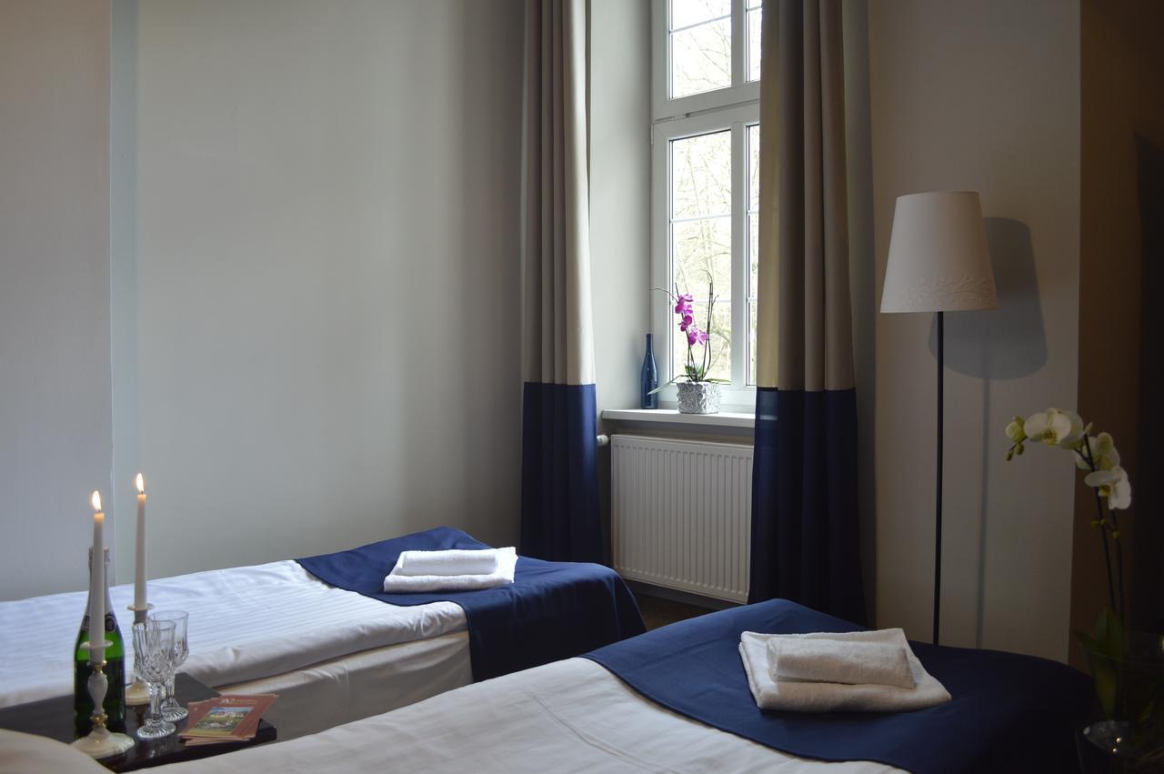 Hotel Ksiezycowy Dworek ケントシン 部屋 写真